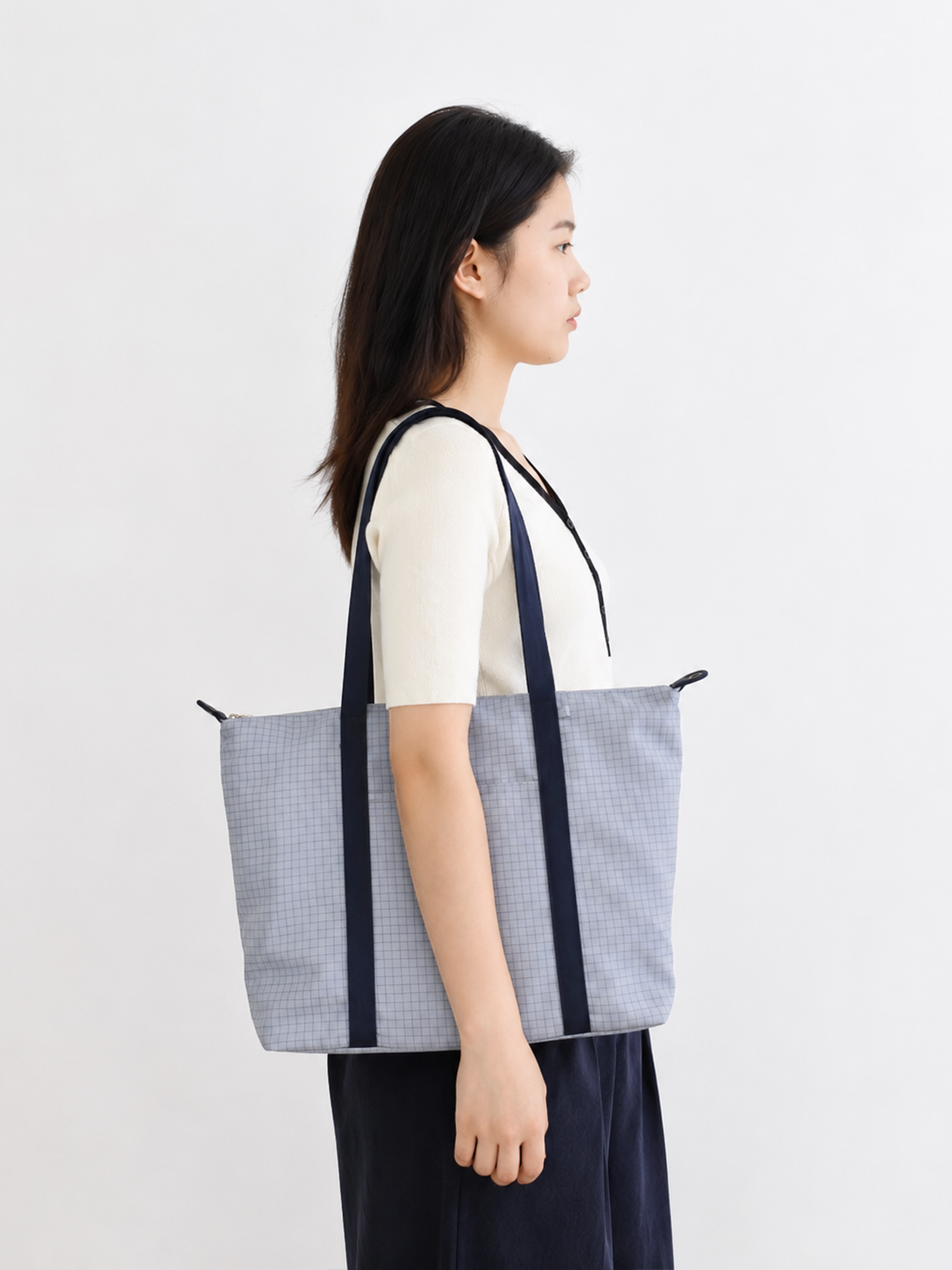 Side view of a light blue 14-inch laptop tote bag for women