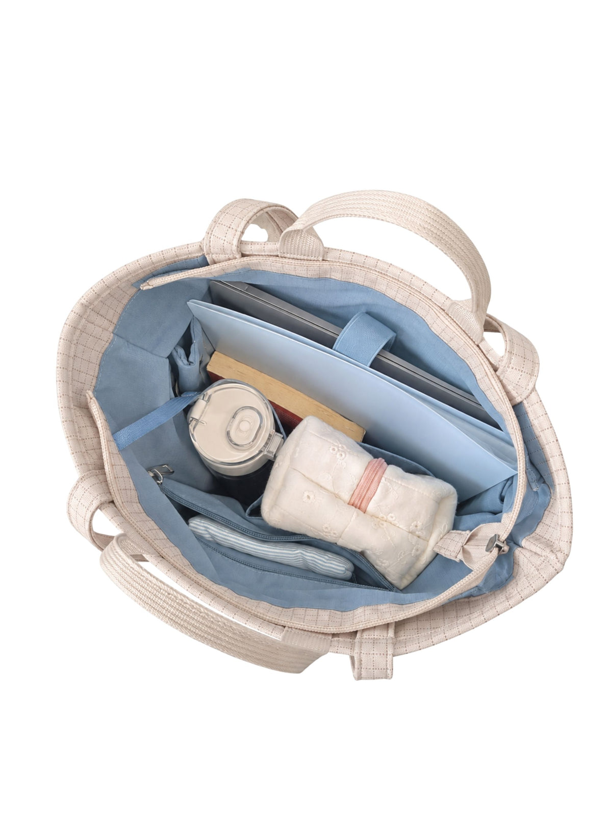 Open beige 15.6-inch vertical laptop shoulder bag packed with laptop and daily essentials