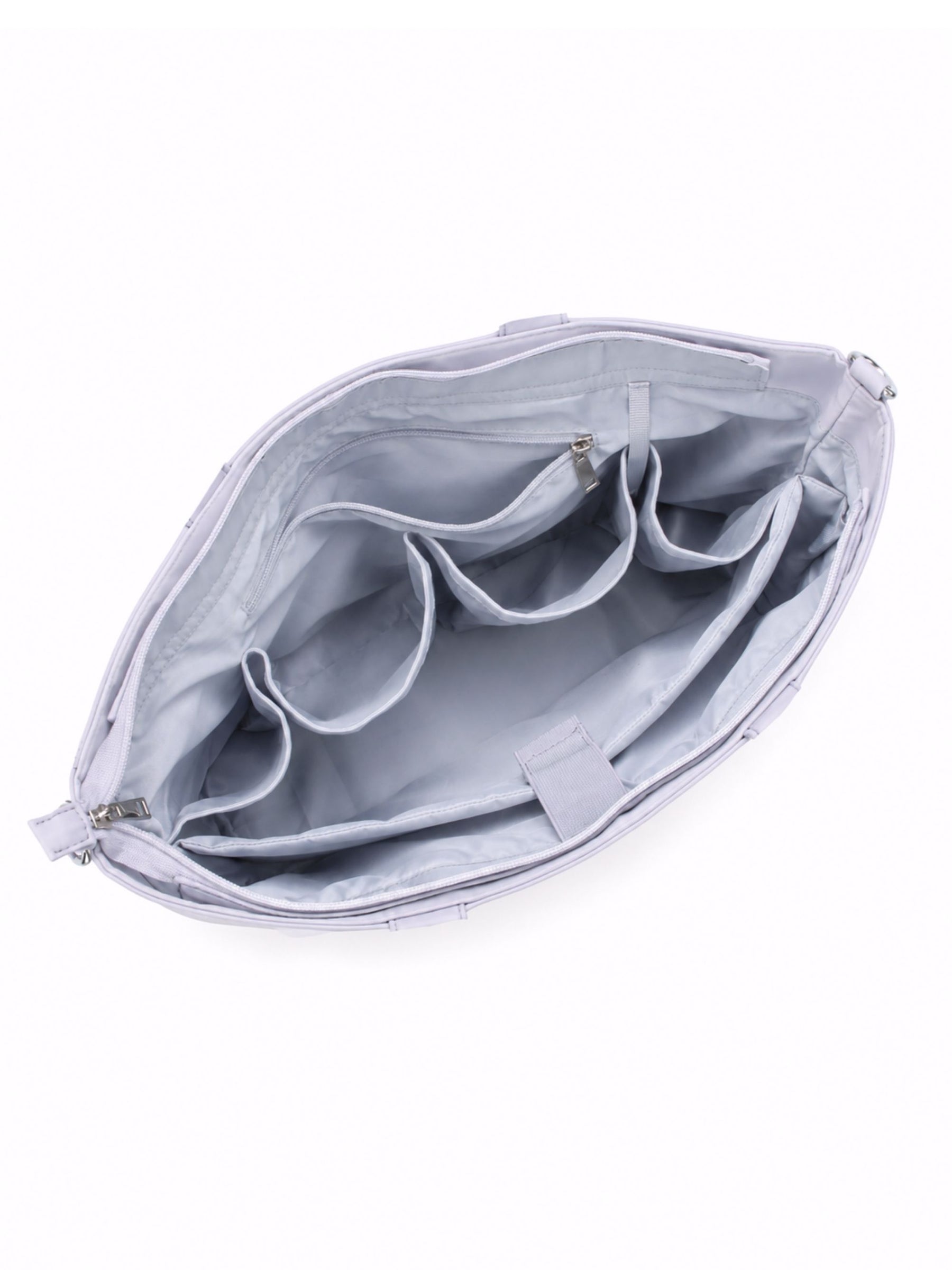 Empty interior of pale blue-purple 16-inch water-resistant laptop tote bag showing organizer pockets